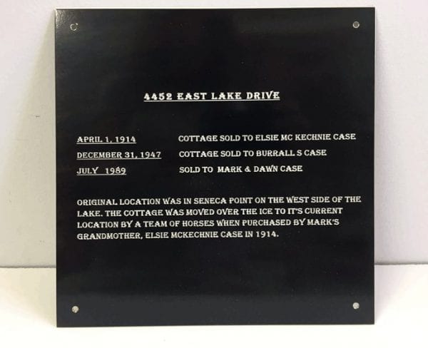Blackened brass plaque for wall