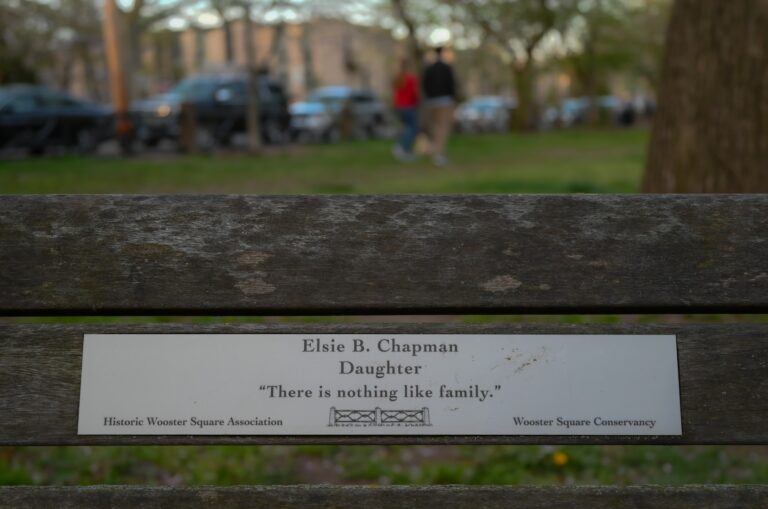 stainless steel plaque on a bench