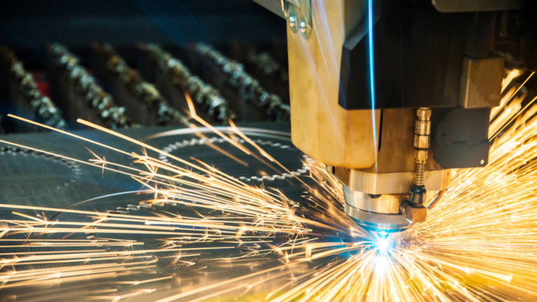 Laser metal cutting manufacturing tool in operation